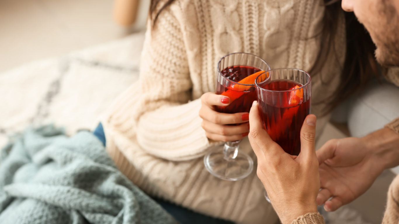 Couple,Drinking,Delicious,Mulled,Wine,At,Home